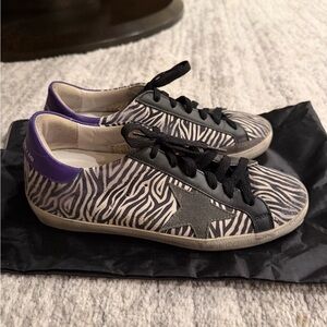 Golden Goose Superstar Zebra-Striped Sneakers.